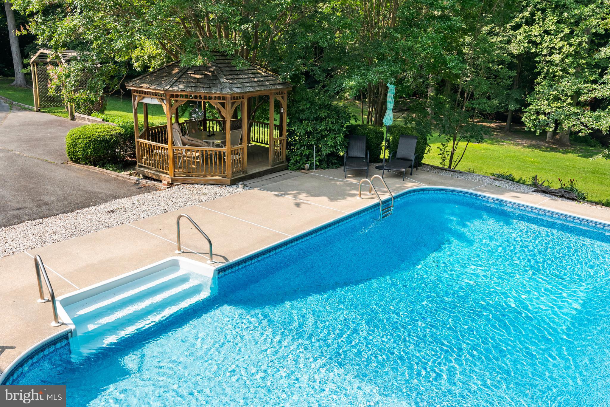 NEW **SELLER IS OFFERING A $25,000 BUYER CREDIT TOWARDS UPDATING**
PARK LIKE SETTING- MATURE TREES- CREEK- BRIDGE ALL ON 3.064 PRIVATE ACRES*** Meticulously Maintained 3 bedroom, 3 bath home, With Den/Office, Bonus Room or Possible in-law/Au Pair Suite with Wheelchair access doors and a Chairlift for easy upstairs living access. Private in ground Pool with Gazebo.
Woods in back half of property with your own Creek and Bridge to access back half of property. Front and back of property are surrounded by Farm Land. *Bonus* RV Parking Site with Water, Electric and Septic disposal.
Come make this Beautiful Home your own- 1st time on market- You don't want to miss this opportunity. Easy access to Restaurants and Shopping. Minutes to Downtown Easton, Hour to Annapolis, 30 Minutes to Kent Island and 1 1/2 hours to Beaches! *** See if your children can find the Gnome!!