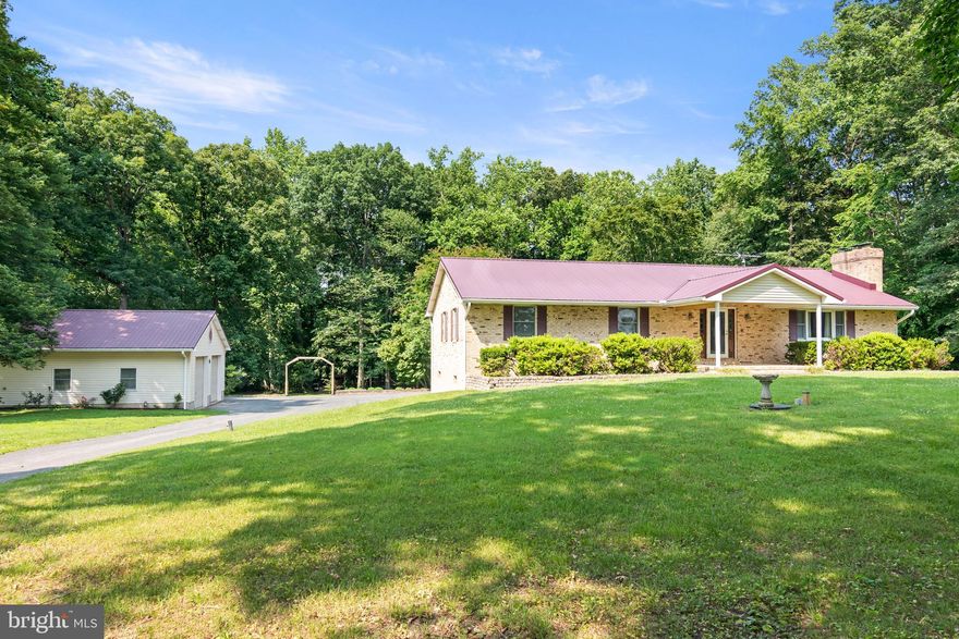 **PRICE IMPROVEMENT**
PARK LIKE SETTING- MATURE TREES- CREEK- BRIDGE ALL ON 3.064 PRIVATE ACRES***  Meticulously Maintained 3/4 bedroom,  3 bath home,  With  Bonus Room or Possible in-law/Au Pair Suite with Wheelchair access doors and a Chairlift for easy upstairs living access.  Private in ground Pool with Gazebo. 
 Woods in back half of property with your own Creek and Bridge to access back half of property.  Front and back of property are surrounded by Farm Land.   *Bonus* RV PARKING SITE with Water, Electric and Septic disposal.
Come make this Beautiful Home your own- 1st time on market- You don't want to miss this opportunity.  Easy access to Restaurants and Shopping.  Minutes to Downtown Easton, Hour to Annapolis, 30 Minutes to Kent Island and 1  1/2 hours to Beaches!  *** See if your children can find the Gnome!!