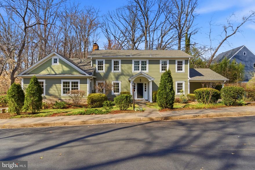 Nestled in the highly sought-after Barcroft neighborhood and so close to the Four Mile Run Trail/bike path, this cherished residence has been lovingly maintained by one family for more than four decades—a rare offering that blends timeless character with exceptional space. Backing directly to serene parkland, the setting is nothing short of idyllic, providing a daily backdrop of natural beauty for those who value privacy, tranquility, and the outdoors. 

Inside, the home unfolds with remarkable scale and thoughtful design. Boasting six true bedrooms, including five generously sized bedrooms on the upper level and an expansive main-level primary suite, the layout offers flexibility and comfort for both everyday living and multi-generational needs. Entry options include a spacious mudroom complete with built-ins and a substantial pantry closet—perfect for seamless organization—or an inviting foyer. The heart of the home is a the kitchen featuring stainless steel appliances, granite countertops, and a sunlit eat-in area that overlooks the lush parkland beyond. The formal dining room and living room with gas fireplace exude classic appeal, ideal for hosting memorable gatherings or quiet evenings alike. The main-level primary suite is a true retreat, offering a generous sitting area, dual walk-in closets, and a spacious ensuite bath—an oasis of comfort and privacy. Upstairs, you’ll find an additional ensuite bedroom, a bright hall bath, and four more well-proportioned bedrooms, ensuring ample accommodations for family and guests. The lower level expands the living space even further, with a large recreation room featuring tile flooring and direct walk-out access to the backyard deck—perfect for indoor-outdoor entertaining. A full bath and sizable utility room complete this level, adding both convenience and functionality. 

Beyond the home itself, Barcroft is celebrated for its vibrant, community-oriented lifestyle. With a rich history spanning over a century, residents enjoy a lively calendar of events—from festive Fourth of July parades and holiday celebrations to Easter egg hunts, National Night Out gatherings, and community dinners. The neighborhood’s blend of historic charm and modern living, with homes ranging from mid-century classics to newer construction, fosters a strong sense of connection and enduring appeal.