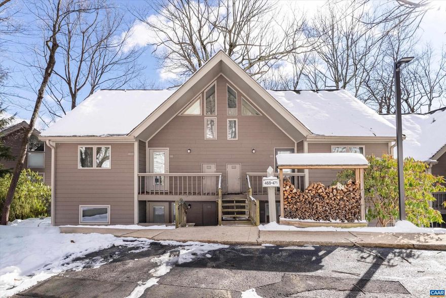 Take a look at this renovated mountain getaway only steps from the slopes! Well designed renovation included new kitchen and beautiful granite counters, new appliances, new furniture, new fireplace surround and more. Murphy bed at foyer allows for a second bed for kids or guests. Updated bathroom, new washer and dryer and walk out deck/patio.  Fireplace in living room. Gated parking in ski season insures secure parking. Energy efficient tankless water heater. Great rental property or make it your very own this winter! Slopes are Open!,Granite Counter,Fireplace in Family Room