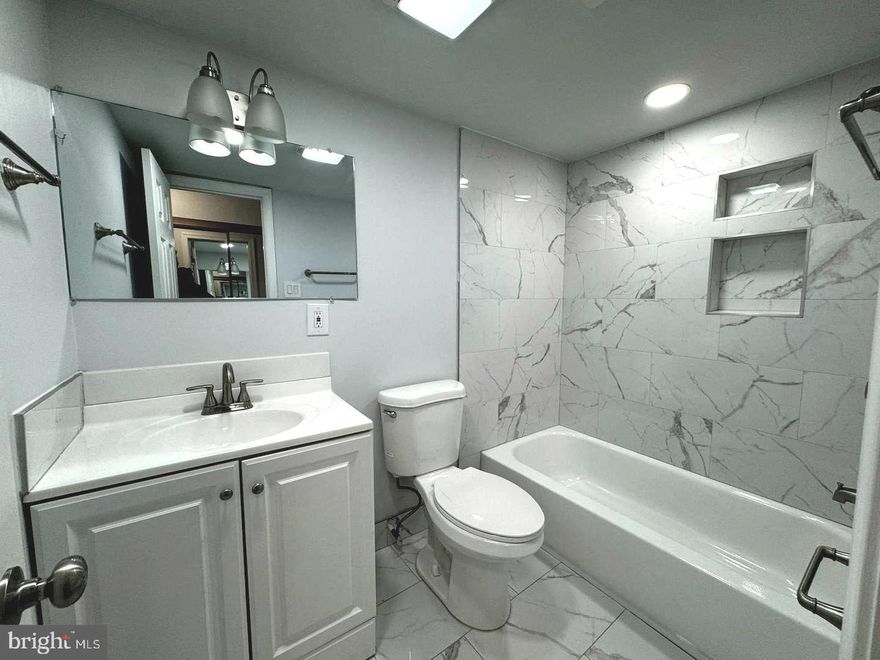 Updated Photos will be Uploaded on Sunday.  BEAUTIFUL, Entirely Renovated 2 Bedroom Condo. Very Specious Unit.  Large Rooms and Big Closets.  High Quality Materials. Hardwood Floor. Granite Countertop. New Cabinets, and More. Washer and Dryer is in the Unit. Management Office is On-Site.  Swimming Pool.  Storage Room.  Low Condo Fee Covers All but Electricity.   Ideally Located Near the Beltway, Suitland Parkway, DC and Public Transportation for Ultimate Convenience. Shopping Centers and Malls are nearby.  Great Living Environment, Owner is Realtor.