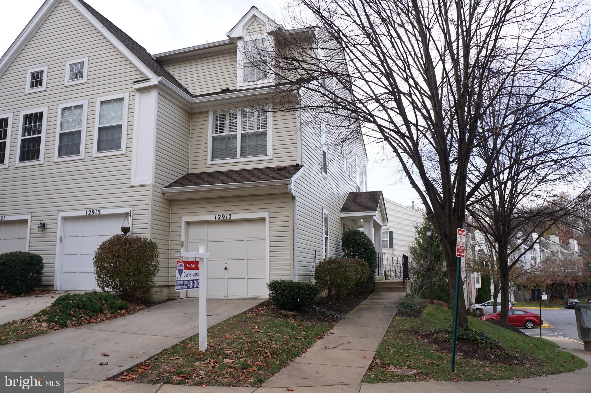 Wow! Light Filled End-Unit Townhome with attached 1-car Garage * 2-Story Living Room with Gas Fireplace and two walls of 2-Story windows * Separate Dining Room with sliding glass door to rear deck * 2 Master bedrooms Suites * Larger one has his & her walk-in closets and huge tiled shower * Bedroom Level Laundry with front load washer and dryer * Eat-in Kitchen with new flooring, newer appliances, gas stove, pantry and more. Garage entrance into 2-Story foyer or side entry from porch * New carpet and paint * Move -in condition * Great location, close to 270, new hospital, Wegman's, shopping, restaurants and more. Priced below market - Sellers have found their new home.