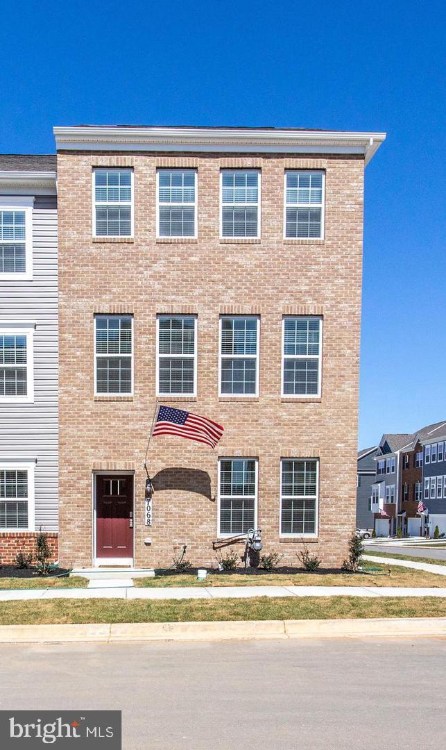 Location! Location!! Location!!! Less than 4 year old Columbus Model available to move in 1st week of August 2025! NO PET PLEASE! This gorgeous 3 level 3 beds 2.5 bath full brick front 2 car garage end unit townhome is located in sought after Westview South that is right at the corner of Westview Promenade Shopping Mall. Walking to shopping, dining and movie theater. Fantastic view of mountains. just minutes from major commuter routes, downtown Frederick, and the Westview Promenade! Inside find an open floorplan of living space, a beautiful classic kitchen including dark cabinetry, backsplash, granite countertops and stainless appliances. Enjoy your coffee on the included deck in the rear, and take advantage of the many community amenities including clubhouse with fitness center. No need to mow grass bc HOA covers everything! Free access to onsite gym, yoga center, and an outdoor pool, Walking trails surrounding the community and tot lot. Free smart home system!