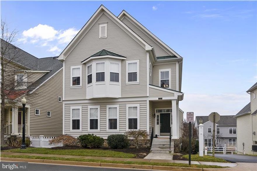 Living well, simplified.  Gorgeous neoclassical design thoughtfully enhanced with custom moldings, 7" baseboards, Rev-a-Shelf cabinet shelving, quartz counter tops and custom breakfast bar, matchstick blinds, and little touches everywhere you look, including a loft workshop  Incredible walk out basement w/9ft walls finished with flexibility in mind, perfect for an au pair or MIL. Call today.