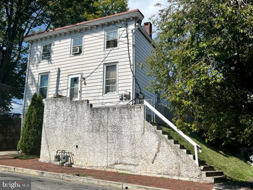 This two unit apartment building is ready for an investor to come in and make it his/her own. After rehabbing you could live in one apartment and rent the other, or rent both units out. There are separate gas and electric meters and one of the apartments has had a new water heater installed in June.  Owner is ready to sell!