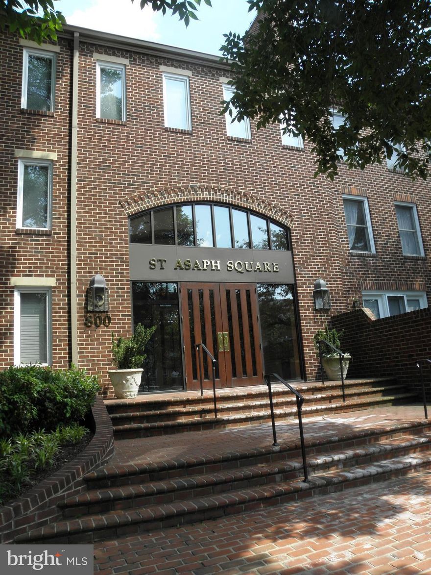 Floors being refinished and new stainless appliances on order!!Spacious 2BD/2BA with French doors opening onto a balcony overlooking center courtyard with pool & patio area*Popular condo in SE quadrant - walk to nearby shops, cafes and waterfront*2 garage spaces & extra storage*Woodburning  FP & washer/dryer in unit*Tenant pays elec & $300 move-in fee(plus $500 elev dep)*NO pets,NO smoking*Vacant and available