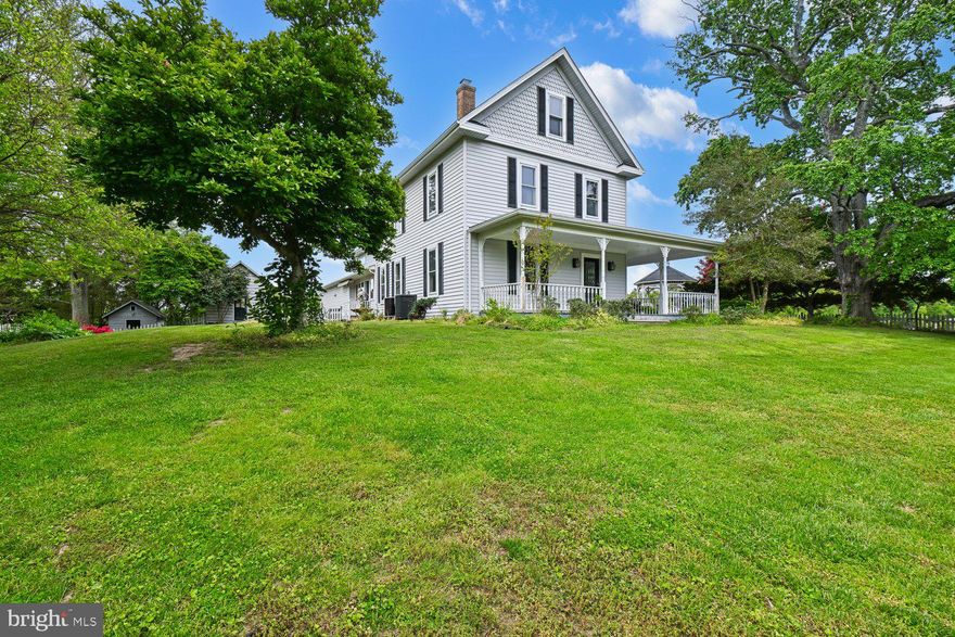 Multi-generational horse farmette only 25 miles from Washington, DC
5 BR | 4 BA | 4,679 SQ FT | 7.23 ACRES

Rarely does a multi-generational horse farmette of this caliber become available this close to Washington, DC. This Victorian farmhouse blends historic character with modern updates, offering 4,679 square feet on more than seven acres of Maryland countryside.

A welcoming front porch and original hardwood floors lead into a modern addition featuring a soaring great room, gourmet kitchen with a sun-filled breakfast nook, and a spacious first-floor primary suite with a jacuzzi tub, dual sinks, and dual walk-in closets. The layout offers the flexibility for comfortable single-level living on the main floor while still providing additional bedrooms and living space throughout the home.

The thoughtfully designed interior also includes a formal dining room, large walk-up attic, expansive storage areas, and flexible living arrangements suitable for multi-generational living, guest space, or potential income-producing use (buyer to verify). A three-car garage with a full bathroom provides additional space for vehicles, hobbies, or a workshop.

The equestrian facilities are a standout feature, including a two-story, three-stall center-aisle barn with dedicated tack and hay storage, water, and electricity. The grounds are well-suited for horses and livestock, featuring a fenced paddock with a run-in shed and water access, as well as a separate fenced pasture. Additional outbuildings include a chicken coop, a tool shed, and an oversized carport.

The property directly borders approximately 250 acres of protected state land with riding trails and frontage along the Patuxent River, creating direct access to outdoor recreation and riding opportunities.

Located along the Legacy Wine Trail, the property offers a rural setting without complete isolation. Approximately 10 minutes to public boat launches and within convenient reach of Brandywine, Waldorf, Upper Marlboro, MD, and surrounding D.C. commuter lots and routes.

Significant capital improvements since 2022 include a new roof, fascia, and gutters with guards; two heat pumps; a high-efficiency heat pump water heater; chimney upgrades; refinished hardwood floors; granite countertops; luxury vinyl flooring in the addition; updated bathrooms; and fresh paint throughout.

This is a rare opportunity to own a functional horse property with acreage, flexibility, and direct access to both nature and nearby conveniences.