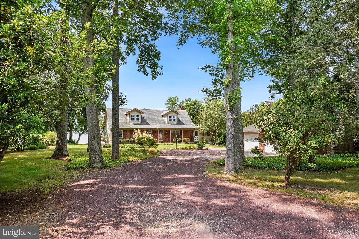 Welcome Home! This 120 feet waterfront property along the South River presents a remarkable opportunity. Renovate this charming Cape Cod or build your dream home in the desirable community of Cape St. John. Nestled upon a generously proportioned double lot spanning 0.62 acres providing so much potential, privacy and all the benefits of public water and sewer. The possibilities are boundless and this extraordinary offering simply must be seen to be fully appreciated. Throughout the home you will enjoy breathtaking water views to capture the splendor of beautiful sunrises and sunsets. The open design of this home ensures effortless living throughout its spacious rooms and the home exudes a sense of well proportioned style. Boasting four spacious bedrooms and two and a half baths there is great space for everyone. The heart of this home features a Great Room overlooking the river seamlessly flowing into the kitchen, this space invites gatherings and memorable moments. With a primary suite option on both the main and upper floors, this home offers versatility and comfort for all residents. The lower level reveals a recreation room and endless possibilities. Along the water's edge, a bulkhead spans the entire 120 feet of waterfront, safeguarding this property's natural beauty. The private pier showcases two lifts and a coveted feature, the pier shed situated at the foot of the pier adds great value, as such structures can no longer be installed. The community itself offers access to a beach, boat ramp, and a waterside playground, enhancing the overall appeal of this exceptional locale. Seize the chance to make this amazing property your own and enjoy life along the water. Sellers have some home renderings to share. Convenient to shopping, restaurants, Annapolis Town Center and easy access to commuter routes to Annapolis, DC and Baltimore. Grab your paddleboard or kayak and get your boat ready to enjoy your summer!