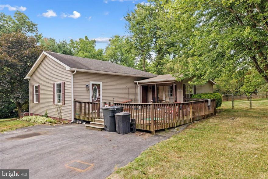 This property offers a trifecta of benefits and is ideal for a starter home, investment property or downsizing to one level. 
Featuring 4 bedrooms and 2 full baths, spacious living area, separate dining room and a kitchen with an island and plenty of cabinet space. The exterior of the home offers a large deck and a fenced in back yard. Situated on over a half-acre lot with no HOA. Cash or conventional financing only and is being sold "as is".