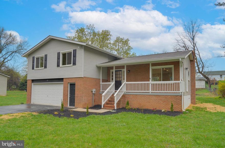 Welcome home to this beautifully updated property in the charming town of Shepherdstown, WV.  Boasting over 2,100 square feet of living space, this spacious residence features 4 generous bedrooms and 2.5 bathrooms, offering ample room for both relaxation and entertainment.  The home has been completely renovated with modern finishes, including new windows, stainless appliances, granite countertops, recessed lighting, and luxurious LVP flooring throughout, providing durability and style.

The heart of the home is the open-concept kitchen, designed with both function and beauty in mind.  New appliances, cabinets, recessed lighting, and a spacious kitchen island adorn this area.  The kitchen seamlessly connects to a cozy eat-in area and flows effortlessly into the inviting living room, making it perfect for gatherings and daily living.  Whether you’re preparing a meal or relaxing with family and friends, this home offers the ideal setting.

The second level of the home has 4 bedrooms and 2 full baths, boasting a master suite.  All three bedrooms are ample sized with sufficient closet space and access to a hall bathroom that features a double vanity and a tub/shower combo.  The spacious primary suite is a welcome sight which features nicely appointed windows and dual closet space located next to the private primary bathroom that is sure to delight any homeowner.

The inviting lower level features a spacious family/rec room, perfect for relaxing or entertaining, complete with a cozy wood stove for added warmth and ambiance.  There is a half bath plus ample closet space for convenient storage, and the laundry room, equipped with a wash sink, adds extra functionality.  The lower level also offers easy access to the outdoors, with a walk-out to a rear patio that leads to a relatively flat backyard, ideal for outdoor activities and gatherings.

The two-car garage offers ample room not only for parking your vehicles but also for additional storage and a dedicated work area.

Conveniently located in historic Shepherdstown, you’ll enjoy the best of both small-town charm and easy access to nearby amenities including the local shopping center, park, downtown shops and eateries, university, plus much more.   Don’t miss the opportunity to make this updated beauty your new home!
