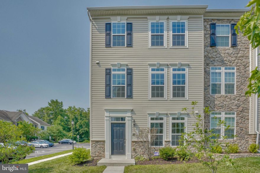 End of group townhouse, sits in the newer constructed community of Villages of Dorchester offers over 2000 sq ft of living space and an attached 2 car garage. While the seller is the original owner, this home feels barely used but new carpet was just installed throughout, professionally cleaned and a fresh coat of paint throughout. Since this is an EOG unit natural light pours into each level. The main level is wide open with wood floors. There's a gas fireplace as well as a half hath on this level, great for entertaining! The dining area is just off the gourmet kitchen. The kitchen has upgraded cabinets, stainless appliances (brand new fridge), granite counters, and a large center island. Off the back of the house, just beyond the french doors, is a care-free trex deck (just power washed). The upper level has 3 bedrooms and 2 full baths. This unit has a true owners suite with large private bath.  The entry level has a bonus den at the front of the house with a lovely french door entrance. The laundry room also sits at the entry level. The large 2 car attached garage with 2 additional parking spaces is at the back of the house. 
This house is tucked back on a dead end street but the location of this community is convenient to Fort Meade, DC, Annapolis, BWI, 295, & 100. The local area is filled with entertainment, shopping and restaurants.