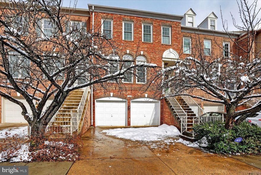 Stately, oversized townhouse in sought-after cluster.  Large rooms, high ceilings, luxurious primary suite.  Oversized 2-car garage.  Steps from the Vienna Metro and a short distance to the center of Vienna.