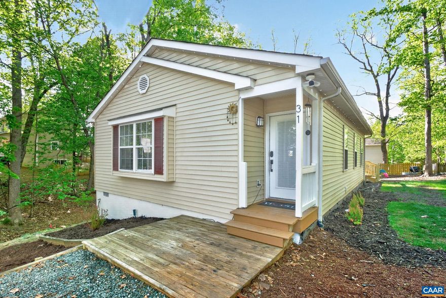 Wonderful move-in ready home near Beach 4! This lovely home all on one level features 3 nice sized bedrooms and 2 full baths along with a nearly level back yard. The owners have done everything so all your clients have to do is move in! Brand new roof, HVAC, flooring, kitchen counters & paint! This home offers tons of natural light and open Kitchen, living room & dining area with vaulted ceilings & sliding doors to rear deck & back yard. Split bedroom design with primary bedroom and bath at front of home offering tons of privacy. This home won't last long!,Granite Counter