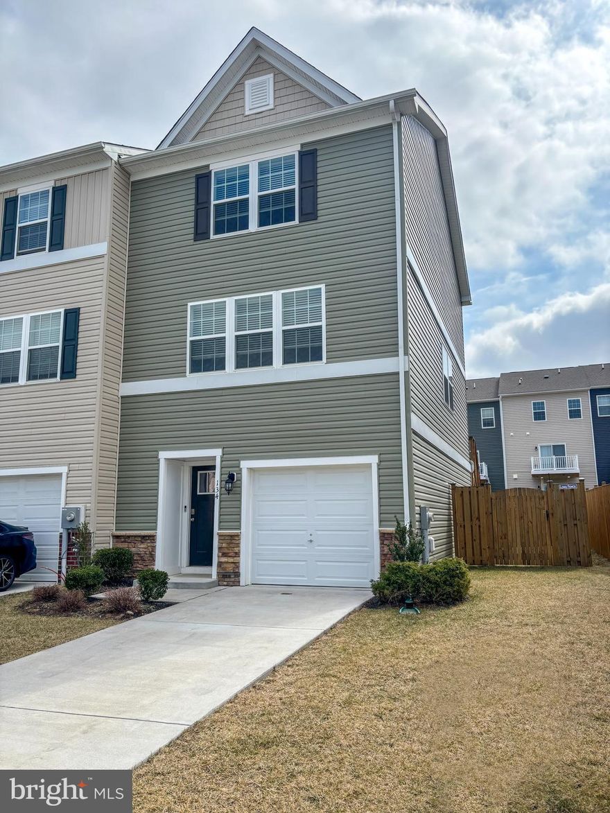 Ready to Move-in! Freshly painted. Like-new, clean and well-maintained end-unit townhome for rent in the Berkeley Ridge community. 

This 3-bedroom, 2.5-bath home offers 1,880 square feet of living space across three floors. The open-concept kitchen features dark wood cabinetry, stainless steel appliances, a large island with bar seating, stone countertops, and a subway tile backsplash. The bright living area receives ample natural light and provides direct access to the deck overlooking the backyard.

The primary suite includes a double vanity, a walk-in shower with ceramic tile, and plenty of storage space. The additional bedrooms are well-sized with nice closets. A second full bath offers a tub/shower combo with tiled walls. The third floor also features a convenient dedicated laundry area with a high-efficiency washer and dryer provided.

The lower level provides additional living space with direct access to a large paver patio and a fully fenced backyard. The attached one-car garage and driveway offer plenty of parking. This home is located next to the Spring Mills School Complex, with easy access to Interstate 81, shopping, and dining.

No smoking. Monthly gross income must be at least three times the rent. A minimum credit score of 650 is required. Tenant is responsible for all utilities and lawn care. A one-year lease minimum is required, with option to renew. 

Pets considered on a case-by-case basis; no aggressive breeds and a 60-pound weight limit. An additional deposit and monthly pet rent will apply. 

Tenant is responsible for all utilities. 1 year lease and month to month thereafter.