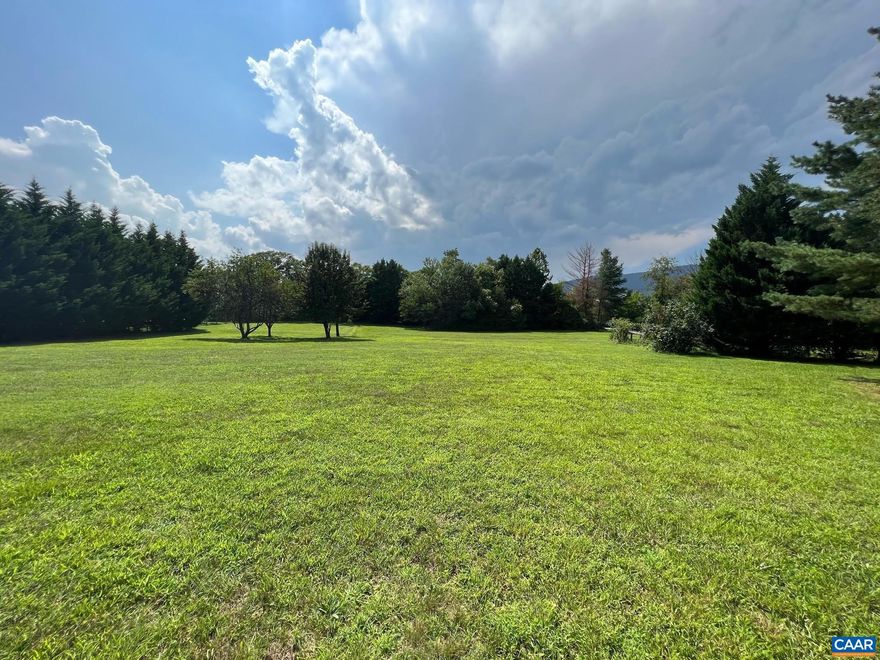 Developmental Land for Sale in the Heart of Crozet. Lots of opportunity for growth with a view of the mountains and 1.5 undeveloped acres.