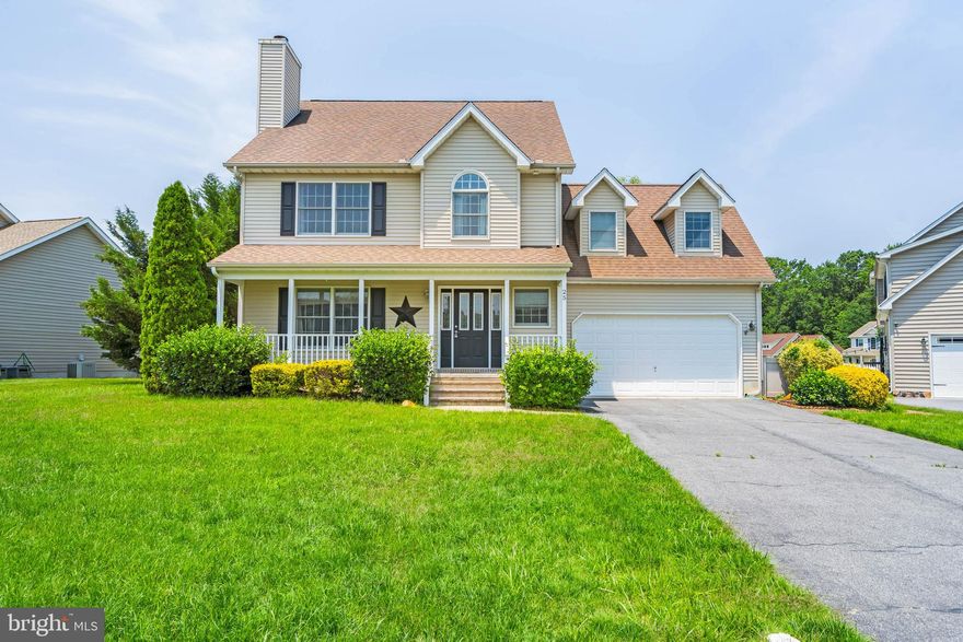 Welcome to this beautiful colonial-style home nestled in the heart of Felton, Delaware. From the moment you arrive, you'll be charmed by the inviting front porch, perfect for relaxing with your morning coffee. Step inside to find hardwood floors that flow through most of the first floor, creating a warm and elegant atmosphere. The spacious great room features a cozy gas fireplace, while the formal dining area is ideal for entertaining guests. The kitchen boasts granite countertops, a stylish tile backsplash, stainless steel appliances, and a breakfast nook that overlooks the peaceful, tree-lined backyard. A convenient powder room and a laundry area with a Maytag front-loading washer and dryer complete the main level. Upstairs, the primary suite offers a private retreat with a double vanity, soaking tub, and separate walk-in shower. Two additional guest bedrooms share a well-appointed hall bath, and a versatile bonus room provides the perfect space for a fourth bedroom, playroom, or home office. Step outside to enjoy the Trex-style deck, complete with a retractable awning for shade and comfort, plus a storage shed for all your outdoor essentials. This home combines classic style, thoughtful upgrades, and a serene setting—don’t miss the opportunity to make it yours!