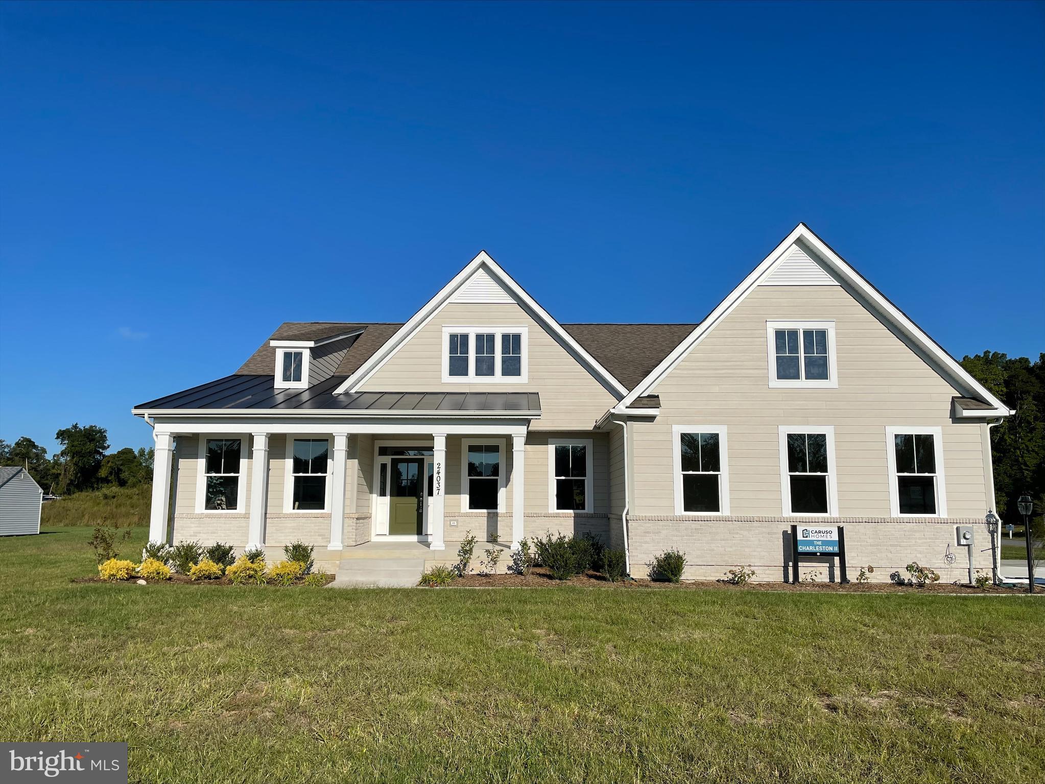 This house is co Marketed with the land at 18526 Brook Road, it is TO BE BUILT NEW CONSTRUCTION. Beautiful lot Co- Marketed with Caruso Homes. This Model is the ----- CHARLESTON II --- The Charleston II is an expansive ranch home plan. Beautiful foyer open to formal dining room and flex room which makes for a great in home office. Huge family room with natural light wall of windows. Chefs kitchen with large island open to family room and breakfast. This home has a spa like owners suite with huge soaking tub and separate shower. His and her vanities and nice sized closet. 6 foot drop zone in mudroom makes a great catch all. This ranch can also be turned into a two story home. You can add a bonus room, craft area, additional full bath and a 4th bedroom. --- Buyer may choose any of Caruso’s models that will fit on the lot, prices will vary. Photos are provided by the Builder. Photos and tours may display optional features and upgrades that are not included in the price. Final sq footage are approx. and will be finalized with final options. Upgrade options and custom changes are at an additional cost. Pictures shown are of proposed models and do not reflect the final appearance of the house and yard settings. All prices are subject to change without notice. Purchase price varies by chosen elevations and
options. Price shown includes the Base House Price, The Lot and the Estimated Lot Finishing Cost Only. Builder tie-in is non-exclusive