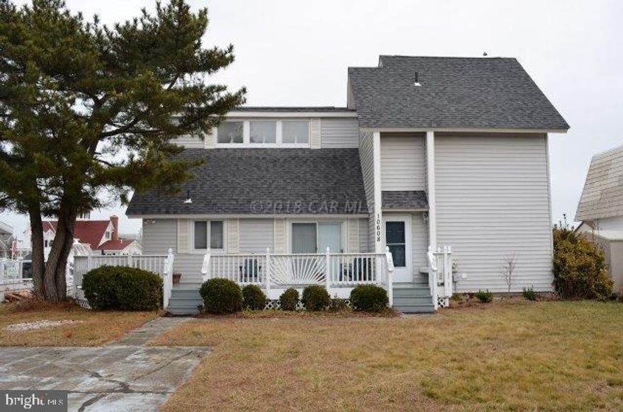 Waterfront Home on SUPERWIDE CANAL. Updated inside with Beautiful Tile Floors. Ready to move in. Boat Lift, Firplace, Wape Around Large Decks. Frist Floor Master. Appox 1/2 mile to the Beach.