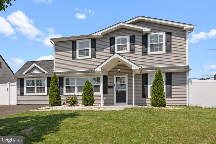 Welcome to this beautifully expanded and meticulously upgraded Levittown Cape Cod, offering 5 spacious bedrooms and 2.5 bathrooms with an open floor plan perfect for modern living.
The main level features engineered bamboo flooring, recessed lighting, ceiling fans, and custom woodwork including chair rail, crown molding, and shadowbox walls. The open-concept layout seamlessly connects the living room, dining room, kitchen and family room, creating the ideal space for both entertaining and everyday comfort.  The kitchen boasts 42” cabinets, granite countertops, glass tile backsplash, stainless steel appliances, and a stylish granite pass-through to the family room. The family room impresses with vaulted ceilings, access to the backyard, a convenient powder room, and laundry area. The main floor also includes 3 bedrooms and 1.5 bathrooms, offering plenty of flexibility and function.
Upstairs, you'll find two generously sized bedrooms and a full bath.
Outside, enjoy a private, fenced-in yard with durable vinyl privacy fencing, a 4-car driveway, and low-maintenance vinyl siding. Located close to major roadways, shopping, and dining — this home checks every box.
Don’t miss your chance to own this move-in-ready gem!