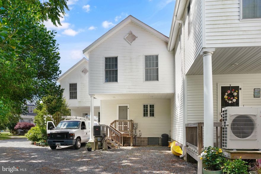 Welcome to your dream home! This charming 2-bedroom, 2 1/2 bath townhouse is nestled in a tranquil setting that promises a serene lifestyle. The community offers convenient water access with docks and a kayak launch, perfect for water enthusiasts. On the first level, you'll be greeted by a spacious living room that seamlessly flows into a dining area. Sliders open to a deck, providing breathtaking views of the nearby lighthouse, making it an ideal spot for relaxation or entertaining guests. The well-appointed kitchen features beautiful oak cabinets, offering a warm, inviting atmosphere. A convenient powder room completes the first floor. Upstairs, the second level boasts two generously sized bedrooms, each with its own private bathroom, ensuring ultimate privacy & comfort for everyone. The laundry area is conveniently located on this floor, adding to the home's practicality. This townhouse combines picturesque views, modern conveniences, & outdoor activities, making it a perfect retreat or year-round residence. Don't miss the chance to make this exceptional property your own!