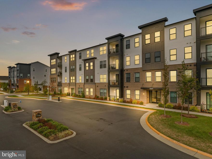 Welcome to 42874 Firefly Sonata Terrace #107 — a stunningly upgraded condo in the heart of Ashburn’s Birchwood Condo community, offering modern style, smart design, and rare convenience. One of the few units in the building with direct garage access, this home blends everyday comfort with elevated finishes throughout.

Step inside to find premium LVP flooring in the secondary bedroom, custom window treatments in every room, and designer matte black fixtures including pendant lighting, ceiling fans, and faucets for a cohesive, high-end look. The kitchen pops with a fresh “Pina Colada” accent wall, sleek pendant lighting, and even a built-in Lazy Susan for added function. Bathrooms feature upgraded lighting and fixtures, while the freshly painted walls in the kitchen, bedrooms, and bathrooms create a bright, move-in-ready feel.

Enjoy the peace of mind that comes from meticulous owner updates — from garage wall refinishing to the thoughtful design touches throughout. Located moments from shops, dining, and the Silver Line Metro, this home delivers both style and convenience in one of Loudoun’s most desirable communities.