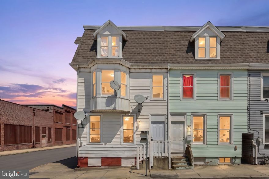 Investor alert! Fully rented 2-unit investment property. Unit one is a 2 bedroom on the first floor rented for $1,100/mo.  Unit two is a 3 bedroom on the 2nd and 3rd floors rented for $1,075/mo. Detached garage at rear of the property is rented for $125/mo. All tenants have written month to month leases. Seller pays sewer and trash.  Tenants pay heat and hot water. This is a great opportunity to pick up an income producing fully rented two unit!