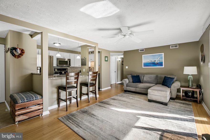 Great opportunity to rent in  Chesterfield Gardens second-floor, two-bedroom, two-bath unit.  Beautifully maintained and updated throughout, this unit displays a light-filled, open-concept living space with sliding glass doors to an upgraded Trex balcony overlooking serene, wooded views. Upgraded kitchen w/ granite countertops, tiled backsplash, and stainless-steel appliances. Primary Bedroom with an ensuite bathroom & built-in granite vanity/desk space. Walk-in laundry room with storage shelving.  Washer and dryer in unit. Great community amenities include a pool, tot lot, basketball court, and tennis court. Convenient to shopping, dining, and Route 100. Easy commute to Baltimore, Ft. Meade, and Annapolis. A MUST-SEE!