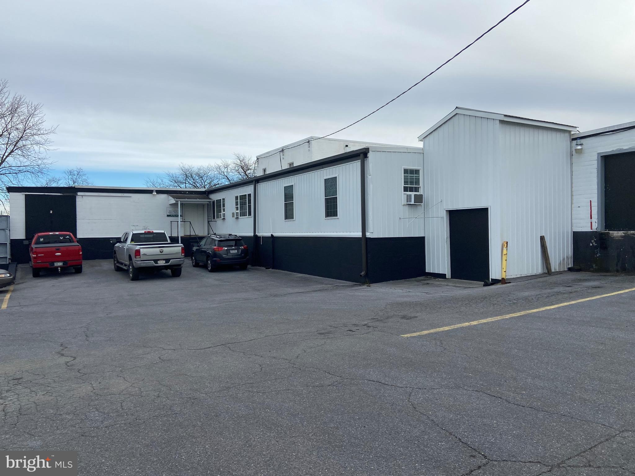 Great property with many possibilities. Currently being used as a food processing facility can easily be converted to flex space warehousing. The property totals 5 acres and could be used for residential town homes.