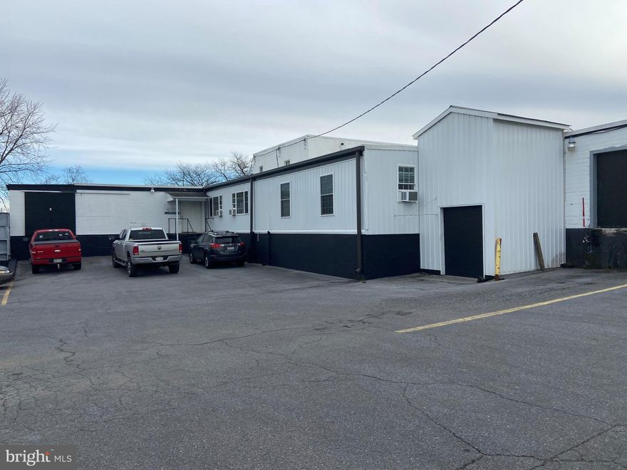Great property with many possibilities. Currently being used as a food processing facility can easily be converted to flex space warehousing.  The property totals 5 acres and could be used for residential town homes.