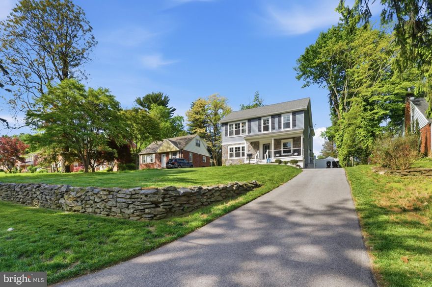 What an opportunity!  Welcome to 732 Oak Way in the heart of Havertown offering a new aesthetic both inside and out! This home, once a cape cod was transformed into a 3200+ above grade Colonial by E Build Construction just 3 years ago offers top of the line amenities, finishes and scale.  The current owners have loved the home and have made thoughtful improvements such as finishing the lower level to include a 2nd powder room and fireplace, replaced the brick with stone for the exterior facade, higher end carpets in 3 of the bedrooms, added custom closets in 2 of the bedrooms, tree removal and landscaping are just to name a few.  This home offers a unique opportunity because part of the foundation was existing therefore the taxes are far cheaper than a new construction home but the square footage is more! Pull up the long private driveway, making the home far off the street.  Head in at the covered front porch.  The first floor beams with natural light everywhere you look and it's got all the specs you need for today's lifestyle.  Formal living room and dining room with wainscotting and recessed lighting, a kitchen and great room to include all the bells and whistles.  A center island with seating, plenty of white shaker cabinets, quartz countertops, a spacious breakfast room and a great/family room with tons of space for larger furniture, a fireplace with shiplap wall and sliders that lead out to the back patio and very large backyard.  Also on the first floor is a perfectly tucked away mudroom with side entry to the driveway and a powder room. White oak floors span the first floor for a clean and cohesive vibe.  Upstairs on the 2nd floor there are 4 bedrooms to include a primary suite with a large full bath and walk-in closet.  The 3 additional bedrooms are all very nicely sized and so is the hall bath.  Also on the 2nd floor is a large laundry room with upper and lower cabinets and a wash tub sink!  The lower level adds a ton of value and versatility to the floor plan.  The current owners have it set up for a movie room with large sectional and a large workout/playroom.  The utilities are separate for convenience.  This home is centrally located and walkable to Steel field parks and playgrounds, minutes from local schools, shopping, dining and public transportation. This home truly couldn't be a better value in Haverford Township!