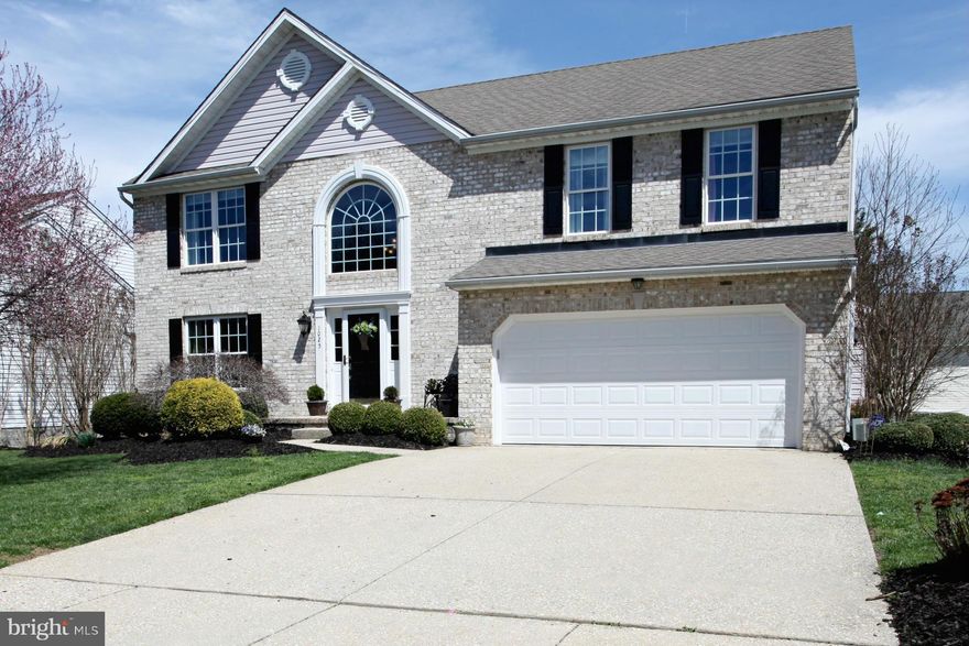 Beautiful 4 Bedroom Brick Colonial boasting over 3200 of finished square feet in sought after West Gate.. Shows like a model!  Newly refinished hardwood floors, granite, updated stainless appliances and finished walk out basement.  Gorgeous large fenced in back yard with mature trees.  Gas fireplace in family room that opens to the updated kitchen. Won't last long!