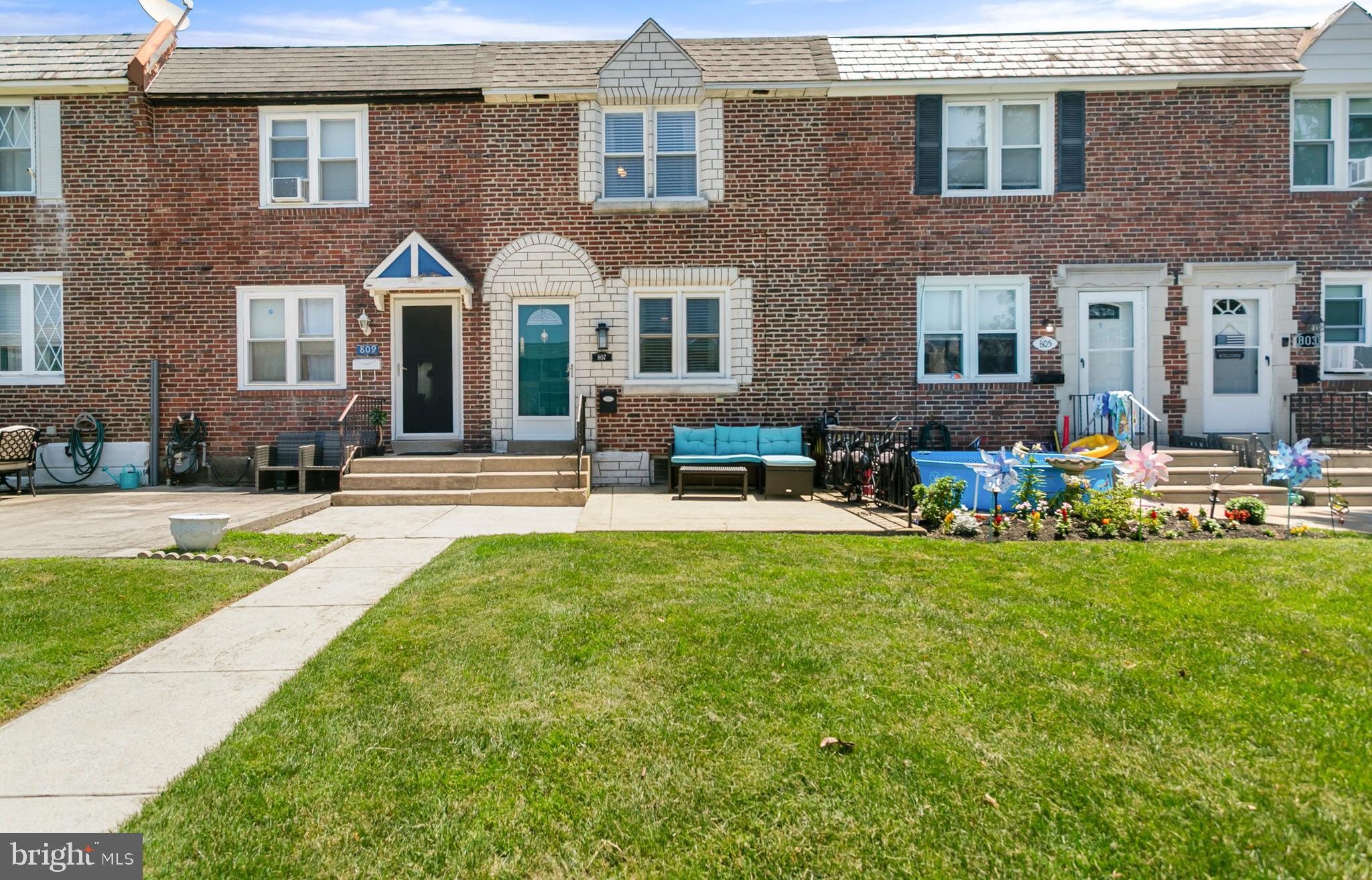 Virtual Tour Available! ... STOP YOUR CARS! This one is a MUST SEE! Welcome Home to 807 Surrey Lane! Located on a great street in the desirable Briarcliffe section of Glenolden, this stunning row home has all that you could need and then some. As you arrive, you will notice the curb appeal and charming front patio. Summer barbecues here you come! Enter the home to find beautiful new LVP flooring and freshly painted walls. The bright and open living space flows seamlessly into the dining room. The modernized kitchen boasts ample cabinets, tons of counter space and stainless steel appliances. Off the dining room, head through the sliding doors to find that the first level offers the HUGE bonus of an enclosed sunroom! This extra living space is perfect for a family room, play room, home office, gym, extra dining space for holidays... the possibilities are endless and the choice is yours! Head upstairs to find new carpets, fresh paint, three bedrooms and one full bathroom. Head down the basement to find a stunning bar area, making this home perfect for entertaining. Can you just imagine watching your favorite sporting events in this space? Additionally, the basement offers another full bath AND even more living space! Out back you will find a large shed, perfect for all of your storage needs and a parking space for one vehicle. Close proximity to public transportation and major interstates... what more could you need?! 807 Surrey Lane is an amazing, turn-key opportunity at an awesome price and it could be all yours! This home is sure not to last so don't wait! Schedule your showing today! ***Upcoming Open Houses: Friday 6/27 5pm-7pm and Sunday 6/29 2pm-4pm***