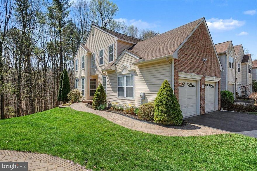 Fantastic end unit townhome in popular North Pointe!!! Rarely available larger model with a two car garage, this property is situated on a premium lot backing to woods and miles of parkland with walking trails. Immaculately maintained by the current owner, this home features a desirable floor plan with several spacious living areas, beginning with its elegant two story foyer open to the living room and dining room filled with natural light. The spacious family room will be everyone's favorite, with it's vaulted ceiling, wood-burning fireplace, built-ins, gorgeous wooded views, and access to the private deck that allows one to relax and dine literally right next to a park! The nearby den offers a cozy additional living space, and the open kitchen includes hardwoods, granite countertops, solid cabinetry, a nearby wide pantry, convenient garage access, and a pleasant dining area with wide bay window. The entire main level has a terrific flow for everyday living and entertaining. Upstairs, you'll appreciate the three generously sized bedrooms with large closets, including a tranquil primary suite with beautiful views, walk-in closet, and spacious full bath with double vanity, garden tub, and convenient stall shower. And there's more... The hardwood staircase leads to the lower level with its huge finished basement, walk-out to paver patio and backyard, a large laundry area with lots of additional storage space, and a fourth bedroom with walk-in closet! Ideally located close to all major roadways, employers, restaurants, shopping, schools, recreation areas, and more. This property is truly an oasis for nature lovers and anyone looking for a serene home convenient to everything the nearby Hockessin and Wilmington communities offer. Don't miss the opportunity to make it your own!
