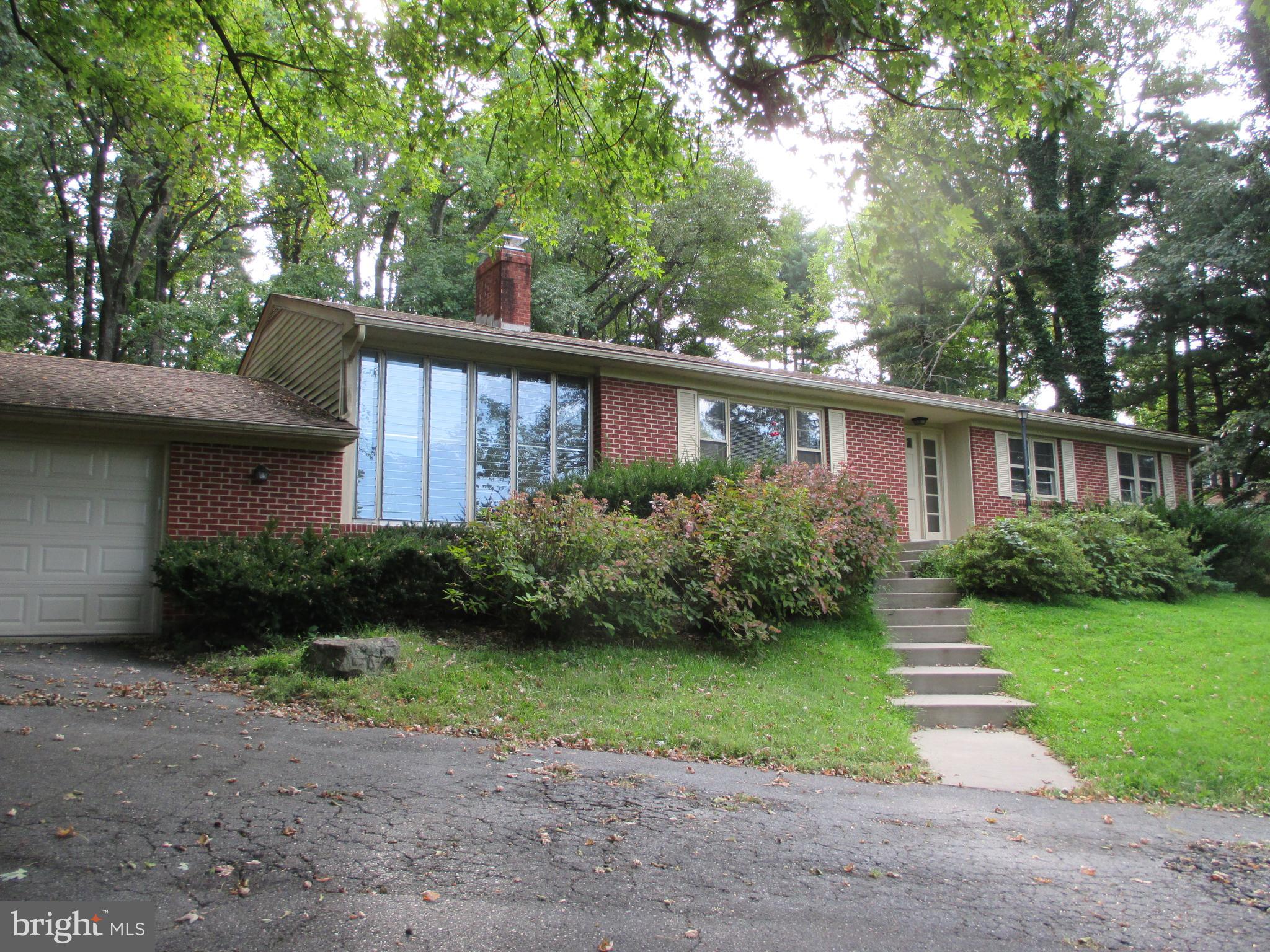 LOCATION! PRIVACY! This property offers an updated kitchen with granite countertops, hardwood floors and a wonderful breezeway! It has a sizeable yard. Small pet considered. Tenant is responsible for all yard work and snow removal. Fireplace is not usable. Application fee is $25/adult. Security deposit is one month rent.
