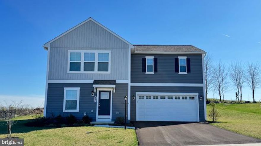 Discover the charm of this stunning Colonial-style home in the desirable Chesterfield community. Built in 2024, and rarely lived in, this spacious residence boasts 1,800 sq. ft. of thoughtfully designed living space, featuring 4 bedrooms and 2.5 bathrooms. The exterior showcases sidewalks, perfect for evening strolls or morning jogs. Inside, enjoy modern conveniences with a suite of appliances, including a built-in microwave, dishwasher, refrigerator, stove, washer, and dryer, making daily life a breeze. The upper-floor laundry adds to the home's functionality.  With an attached garage and ample driveway parking, convenience is at your fingertips. Chesterfield is known for its nearby parks offering green spaces for recreation and relaxation. This home is not just a place to live; it's a place to thrive. Embrace the warmth and comfort of Chesterfield living!