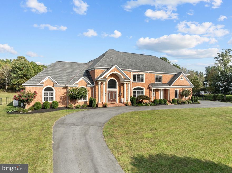 Welcome to 12713 Greenbriar Road in Potomac, MD!  This exquisite 9 bedroom, 6 full and 3 half baths residence offers exceptional comfort, timeless elegance, and resort-style amenities, all on a private 2 acre parcel.  As you enter the home, your eyes will be immediately drawn to the high ceilings in the foyer and all the natural light from the  large windows in your two story family room.  The main level also features a spacious primary suite with an attached office, your primary bathroom with a double sided fireplace and a spacious walk-in closet.  The primary suite also has your own private entrance to the back porch.  The main level also features a formal dining room, a breakfast area, an incredible sun room with backyard views of the pool, a spacious kitchen with a large island, a large pantry and mud room, a wet bar, butler's pantry and 2 half bathrooms and an over-sized 4 car garage!    Upstairs, you’ll find six large bedrooms, two with en-suite baths and the other four all have direct access to bathrooms. The walkup lower level is designed for both recreation and relaxation, offering a spacious entertainment area with a gas fireplace, a wet bar, a gym, a theater room, 2 additional spacious bedrooms, another full and half bath, and a large storage area.  Outdoors, enjoy a sparkling built-in pool with re-tractable summer cover and a stone patio — perfect for entertaining on late summer evenings. The roof is roughly 6 years old and one of the HVAC's was replaced in 2024.  There is also a radon remediation system and a generator.  This home seamlessly blends luxury, functionality, and stunning scenery—in the top rated Churchill High School District and just minutes from Potomac Village.  Welcome home!