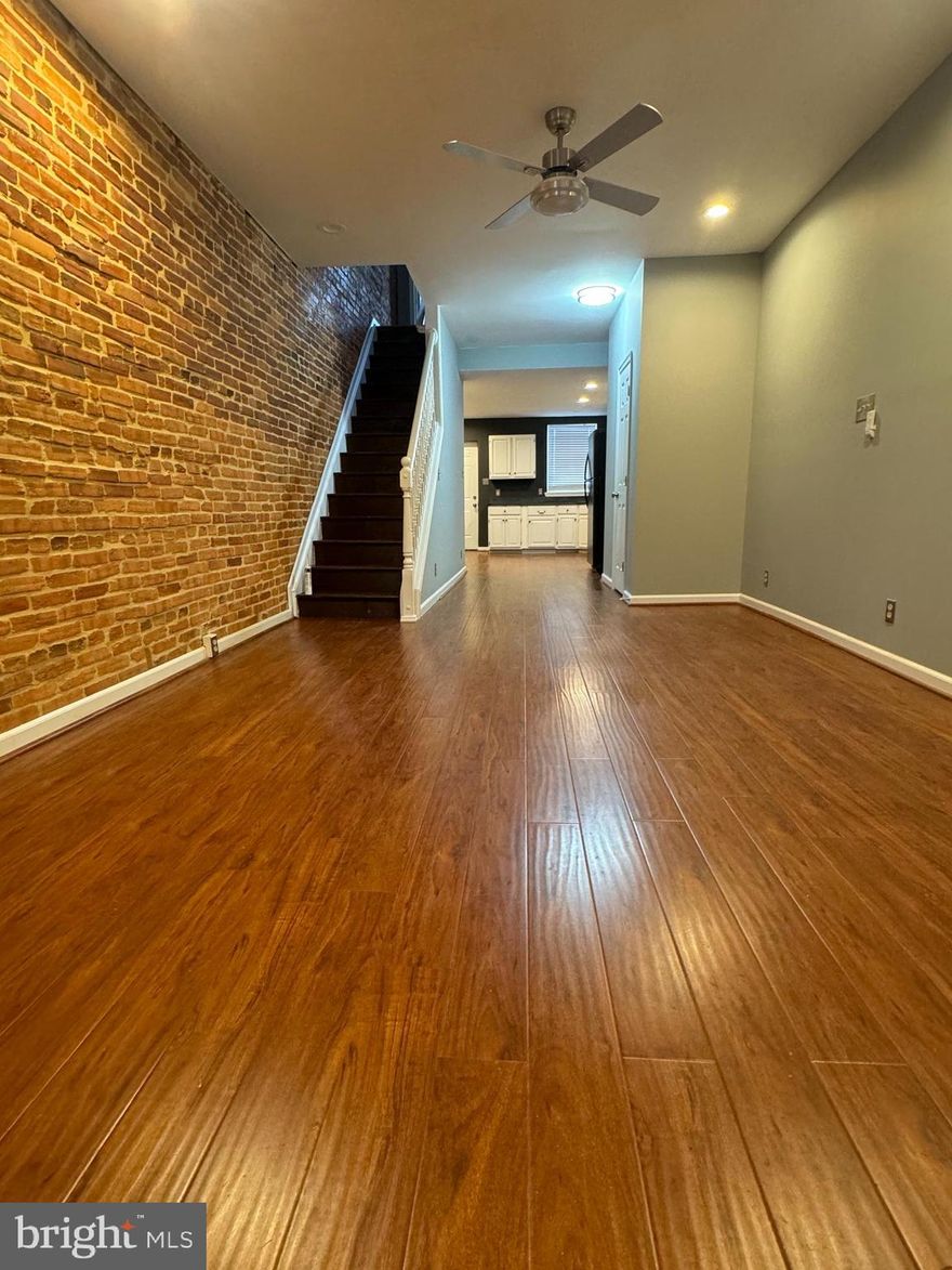 Step into this beautifully updated rental, featuring gleaming hardwood floors and fresh paint that create a warm and inviting atmosphere from the moment you enter. Perfectly located for convenience, this property is ideal for renters seeking comfort and accessibility.

The heart of this rental is its large open kitchen, now boasting a brand-new stove, perfect for whipping up your favorite meals. The modern amenities and spacious layout make it ideal for casual dining or hosting friends and family.

Convenience continues with a brand-new washer and dryer, offering in-home laundry right at your fingertips.

Downstairs, you'll find a spacious and clean basement, providing ample storage or a versatile space to suit your needs. The updated bathroom adds a touch of elegance with its contemporary fixtures and design.

This rental is in a prime location, just minutes from Johns Hopkins Bayview and Main Campus, with easy access to major routes like I-895 and Route 40. Enjoy the vibrant nearby neighborhoods of Canton and Fells Point, offering fantastic dining, shopping, and entertainment options. Plus, downtown Baltimore is just a short drive away, putting the best of the city within reach.

Don’t miss the chance to call this stunning rental home! Schedule your tour today to enjoy the perfect blend of style, convenience, and city living—complete with all-new appliances!