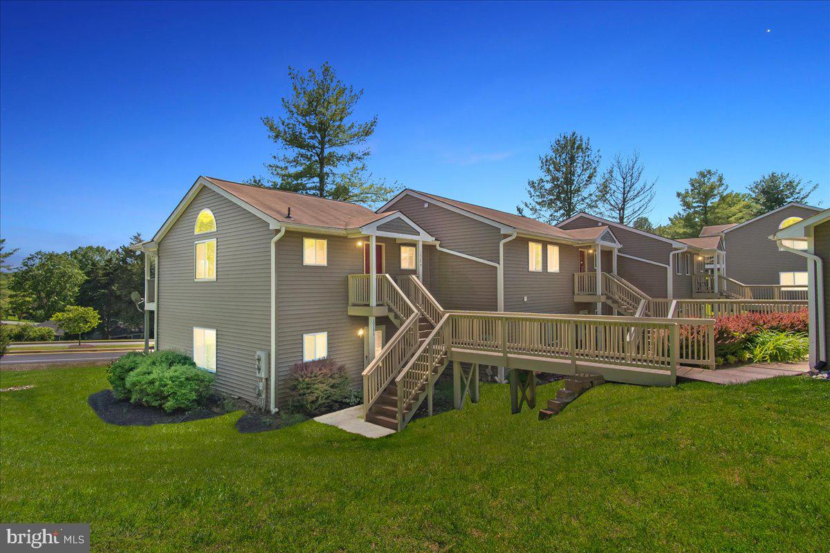 Enjoy this 1 bedroom, 1 bath end-unit, top floor condominum in the community of Lake Linganore. As part of Lake Linganore you have access to 4 pools, a beach area along the 210 acre reservoir lake, basketball & tennis courts and more. Plus, you are just a short walk to the swimming pool, tennis and community open space. This end unit location is very private with no neighbors on one side and no neighbors above. A dramatic cathedral ceiling features a large palladian window in the middle of the living & dining areas looking out to open space. An attractive electric fireplace with mantel is in the living room. Enjoy the open views from your private deck. A one-car carport is included!