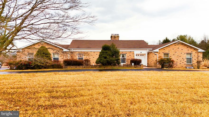 PRICE REDUCED !! This exceptional brick home, formerly operating as a licensed assisted living facility, offers a unique blend of residential comfort and commercial potential. Situated on nearly 5 level acres, the property provides ample space for various uses, including the possibility to expand the facility to accommodate up to 40 clients—a plan previously halted due to personal reasons. Buyer responsible for their due diligence.

Key Features:

Bedrooms & Bathrooms: The home boasts 4 spacious bedrooms and 3 full bathrooms, ensuring comfort and privacy for all occupants.

Living Spaces: A welcoming brick fireplace serves as the focal point of the living area, creating a cozy ambiance. The large rear patio extends the living space outdoors, perfect for relaxation and entertaining.

Storage & Utilities: Generous closet space, including cedar-lined closets, and attic space offers abundant storage. The unfinished basement provides additional potential for customization. Propane utilities ensure efficient heating and energy use.

Recent Upgrades: The plumbing has been upgraded within the last 10 years, and the roof is only 3 years old, offering peace of mind regarding major structural components.

Whether you're seeking a spacious family home, a property with business potential, or a combination of both, this residence presents a rare opportunity. Its expansive land, thoughtful design, and recent updates make it a standout choice for discerning buyers.