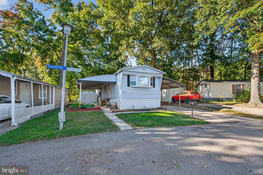 Welcome to 210 Trailway Road! This beautiful 2-bedroom, 1-bath manufactured home is move-in ready and full of potential. You’ll love the open concept, recessed lighting throughout, central A/C, and the convenience of having your own washer and dryer.

Outside, enjoy a nice yard with a covered patio, perfect for relaxing or entertaining and a private driveway and a spacious shed for extra storage. A great home that’s ready for you to make it your own!

MUST GET PRE-APPROVED BY WILLIAMS ESTATES- PEPPERMINT WOODS