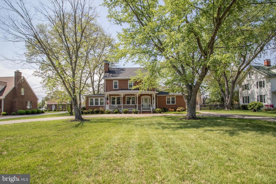 Seller offering up to 3% in Closing assistance - Close in July, just in time for summer in Leonardtown! Built in 1942, this 5-bedroom, 2.5-bath home offers over 3,200 square feet of character-filled living space 
Original hardwood floors, arched openings, detailed trim work, and vintage glass door knobs are just a few of the timeless details that give this home its warmth and soul—while updates like a newer heating system, domestic hot water, roof, and refreshed bathrooms bring you everyday comfort.
With natural light in all the right places highlighting the home’s spacious layout and warm, welcoming feel. A deep front porch sets the tone for quiet mornings, while the fenced backyard and two-car garage—with workshop space—add function to match the charm. And with coffee shops, restaurants, and Leonardtown Wharf just blocks away, it offers a walkable lifestyle.

Lovingly cared for by just two families since it was built, this home is ready for its third chapter.