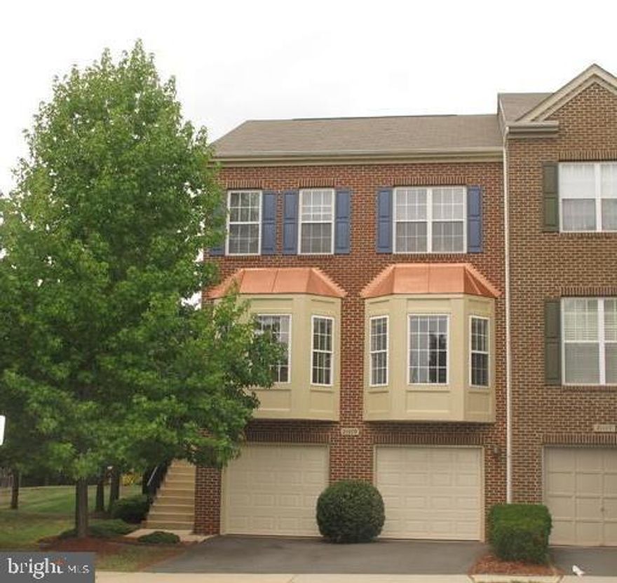 Huge end unit with 3 levels bump out, wall of windows with natural daylight, more living spaces than most single family homes in the area, side entry to a two story foyer, living and dining room with 2 large bay windows, kitchen with breakfast area over looking sun room, convenient main level laundry with washer and dryer, 2 level deck leads to a fence back yard. Master bedroom boast cathedral ceilings and sitting room with windows on all three sides, walk in closet and garden bath, 2 additional bedrooms and one full bath, lower level family room with gas fireplace, and great room, sliding glass door to rear yard. Home located at Dulles Town Center area, very convenient to shops and public transportation, in between Tyson Corner and Dulles Airport, in the heart of High Tech employment area. No pet, no smoking in the property, good credit is a must. PLEASE NOTE: Some new appliances will be installed, hardwood on main level will be refinished, new flooring on upper and lower level will be installed by August 7. Flooring samples in the house. SHOWING Contact Showing Agent to schedule showing. ONLINE APPLICATIONS ONLY - No paper applications accepted.