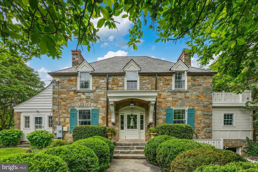 Step into a piece of history reimagined for modern living. Originally built in 1933 and once home to the esteemed Hitt family, this extraordinary farmhouse blends timeless charm with luxurious updates and sophisticated design. Thoughtfully expanded by the renowned builder Natelli, every detail has been curated for elegance, comfort, and functionality across four beautifully finished levels.

The home’s heart is its expansive and light-filled main level, where original character meets thoughtful renovation. The formal dining room sets the stage for elegant entertaining, while the eat-in kitchen, anchored by a custom banquette and rich cabinetry, seamlessly marries form and function. A striking preserved stone wall—once the home’s original exterior—adds warmth and texture. Just beyond, a butler’s pantry with built-in cabinetry leads to a mudroom complete with a secondary refrigerator for added convenience. The gracious formal living room and richly appointed library offer custom built-ins and refined spaces for gathering or quiet retreat, while the inviting family room and elegant powder room complete the main living area.

An exceptional in-law suite, with its own kitchenette, bath, laundry, and private entrance, offers ideal accommodations for guests, extended family, or au pair living—fully integrated, yet entirely independent.

Upstairs, the primary suite is a serene sanctuary with two custom walk-in closets and a spa-quality bath featuring a soaking tub, separate shower, private water closet, and dual vanities. A second ensuite bedroom reflects the home’s original footprint, while two additional bedrooms share a beautifully appointed hall bath. A full laundry room on this level adds ease to daily living. A private second upper level hosts an additional bedroom with generous closet space, offering privacy and flexibility for a home office, studio, or guest quarters.

The lower level features a spacious recreation room, abundant storage, and updated mechanicals.

Outside, the home is surrounded by beautifully manicured, level grounds that invite both relaxation and play. A slate patio with a built-in fire pit creates the perfect setting for alfresco evenings, while a wheelchair-accessible walkway ensures ease of access throughout the property. A dedicated play area, charming tree house, and detached shed offer space for fun, creativity, and storage. The home features additional green space provided by an existing easement with Arlington County. 

A one-car garage completes this exceptional offering. Additional information regarding the existing easement is available upon request.

Rich in heritage yet refined for today, this extraordinary farmhouse offers an unmatched combination of character, craftsmanship, and comfort in a truly unforgettable setting.