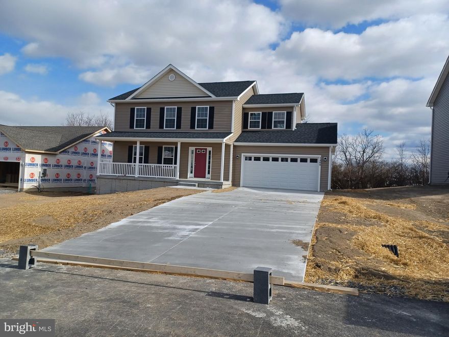 Great family home situated well established neighborhood. Great commuter location and convenient to schools & shopping. Kitchen has granite countertops with island and is open to family room. LVP flooring in  foyer, dining and Kitchen area.  Living room has carpet. 10 X 12  deck with vinyl rails and accessible from the kitchen for easy grilling or enjoying your morning coffee.   This home features 3 large bedrooms and a primary suite with tray ceilings on the upper level.   All bedrooms have standard fan/lights. Primary bath has ceramic flooring and ceramic surround in oversized shower with seat, glass doors and a walk in closet.  Laundry room on bedroom level with tiled flooring. Two car garage which is insulated, lots electrical outlets, insulated garage door and opener. Full walk out basement with family room and  3rd full bath.  Photos shown are of similar construction but may show some upgrades. Tons of standard features that other builders charge for as options. Depending on stage of construction, Homeowner may pick all interior finishes. Models Available for viewing. As with all new construction, WV transfer taxes are paid by Purchaser.