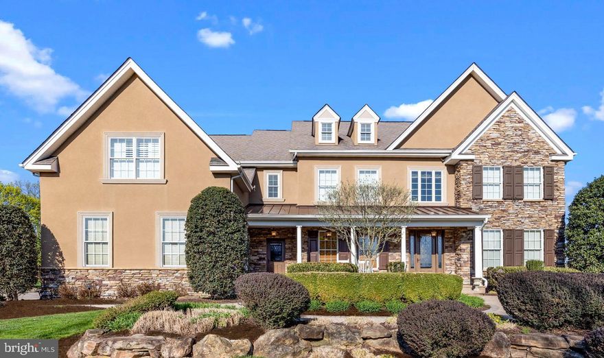 Exquisite Five bedroom and five-bathroom Center Hall Colonial in Council Rock School District and residing in the desirable community at Woods at Northampton. This Frankford model is the largest at 4,892 square feet and set on 1 acre. Updated and well appointed.

Must see the recent First-Class improvements!! Enter home through custom front door with leaded glass and find two-story foyer with extensive decorative moldings and wainscotting throughout the first floor.  Hightlights of foyer include Oak staircase. Updated kitchen has Epicurean, Tuscan, and gourmet attributes. Granite counters, tiled backsplash, top of line stainless steel appliances; Sub Zero Refrigerator, along with Sub Zero refrigeration drawers, two dishwashers, Kitchen Aid double wall oven with custom warming draw, convection microwave, six-burner Wolf gas stove embedded in stone alcove, water line for pot filler, built-in ice maker, Butler pantry, and electric fireplace for additional ambiance.  Breakfast area with French door to patio and back yard.

Windows replaced to the Pella brand. Alarm system, Hardwood floors in much of first floor. Back staircase. Recessed lighting throughout, Two tankless water heaters and the two HVAC units are less than 2-years. Plantation shutters.  Include full house generator and full house water softener.

Additional features include ornamental wrought iron door between kitchen and formal dining room, two-story family room with coffered ceiling, gas fireplace with beautiful floor to ceiling stone surround, Dining room with trayed ceiling, first floor office, abundance of closets throughout home. Back staircase with wrought iron rails.  Oversized mud room with custom cubbies, cabinets, drawers, and desk area.

Second floor has five bedrooms all offering large closet space. Bedroom with custom built-in dresser.  Primary bedroom is spacious and has a trayed ceiling and nicely sized sitting room with decorative pillars, and large walk-in closets.  Fully renovated Master bath has large steam shower, claw tub, and double vanity. Hall bathroom has double vanity.  Laundry room redesigned for upper level just makes sense having tile floor and detergent cabinet.  Comfortable loft /bedroom with built-in bookshelves. Plantation shutters throughout this floor.

Basement, designed as an Irish Pub, is a walk-out having cherry wood trim, luxury vinyl flooring, Philadelphia bricks, tin ceiling, built-in cherry wood bar area with sink, Wine Cellar, movie room, playroom, full bathroom, and lots of storage.

Unbelievable curb appeal.  A covered front porch with metal roof is great for morning coffee or afternoon tea. Grounds are professional landscaped with underground sprinkler system. Entire driveway has professionally laid paver blocks with decorative inlay. Three-car garage with epoxy floor and newer garage doors. Whole house Generac generator. Back yard paver block patio with well-constructed overhead pergola.