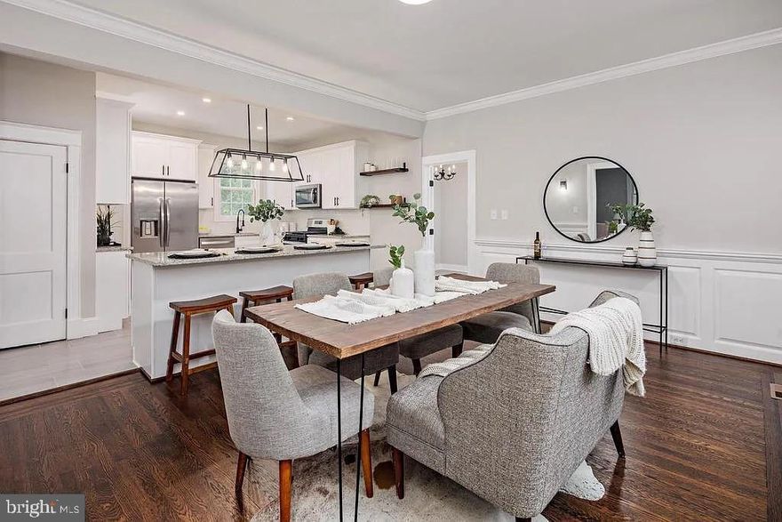 Stunning Mount Washington Single Family Home.  This home has so much of it's original charm, but has been beautifully renovated for all the modern conveniences and features.  This stunning home offers 2,600 square feet of above-grade space, to include 5 bedrooms and 3 full baths. The home includes an entire floor dedicated to the owner's suite, complete with ensuite bathroom, walk in closet, and a spacious laundry room.  All the rooms are generous in size and welcoming.  Entering through the stained glass surrounded front door, you'll be wowed by the beautiful entry foyer and gorgeous staircase.  The living room is charming and is complete with a cozy fireplace and impressive mantel.  The kitchen is modern and ideal for cooking and entertaining.  There is an unexpected treasure in the form of a bonus room at the back of the house.  This would make an ideal library, rec room, fitness room, office....there's no limit to the possibilities.  The hardwood floors on the first and second floors are original and have been beautifully and meticulously refinished. The outdoor space is equally stunning.  The full front porch is covered and comfortable.  There is another full porch on the back of the house, on the second floor.  It allows you to overlook the beautiful backyard, where there is a patio for entertaining.  The home includes a full size basement for all the storage you could ever need.  And the house has a driveway for off-street parking.  All of the renovations were completed by licensed professionals, ensuring high quality and your peace of mind.  Don't miss the opportunity to make this gem of a home yours!