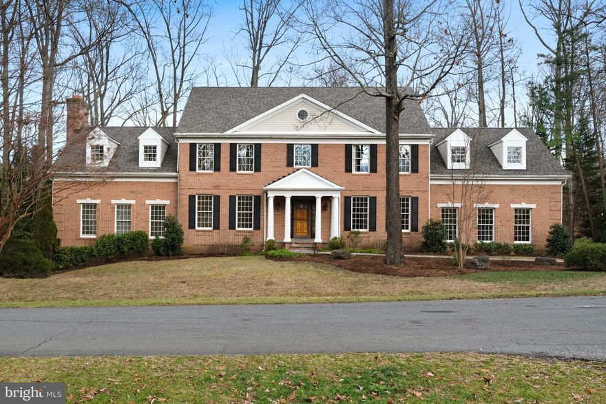 Stunning home in water privileged Stonington. A stone walkway leads you to the custom front door of this elegant 3 sided brick home ( first time on the market.) 5,835 finished square feet on 3 levels (4,586 above grade; 1,249 in finished lower level) Many wonderful features: main level with 9' ceilings, Andersen windows, flooring is all hardwood - just refinished; entire home professionally painted, new carpet in upper level; new luxury vinyl plank in finished lower level. New roof in December 2023; 2 new water heaters (January 2024). Light filled eat in kitchen with white cabinetry, granite counters, pantry closets. The kitchen overlooks the incredible family room with 11' ceilings, built ins, wood burning fireplace. Main level mud room/ laundry room has hooks and cubbies for storage, and a shower (dog baths made easy!), large paver patio for backyard enjoyment. Back of house is concrete siding so very low maintenance exterior.  Upper level has 4 bedrooms and 2 full baths, with an large flex space room off two of the upstairs bedrooms - play room, study room, whatever you need. The primary suite has walk in closet, spa like bath with whirlpool tub and custom tiled walk in shower. There is also a very generous sitting room easily used as a home office/workout area/craft area. The finished lower level (w 9' ceilings) has two more bedrooms, a full bath, great recreation room, and a work shop that is perfect for projects of all kinds (and a walk out stair well to yard for easy access). Plus there is a spacious attic for storage of memory treasures (accessed by pull down staircase). Two car oversized side load garage is 24 x 28 with built in shelving. The community has a pier on the Magothy River, picnic area, small beach, pickleball/tennis courts, and basketball court, and a tot lot. Broadneck School District.