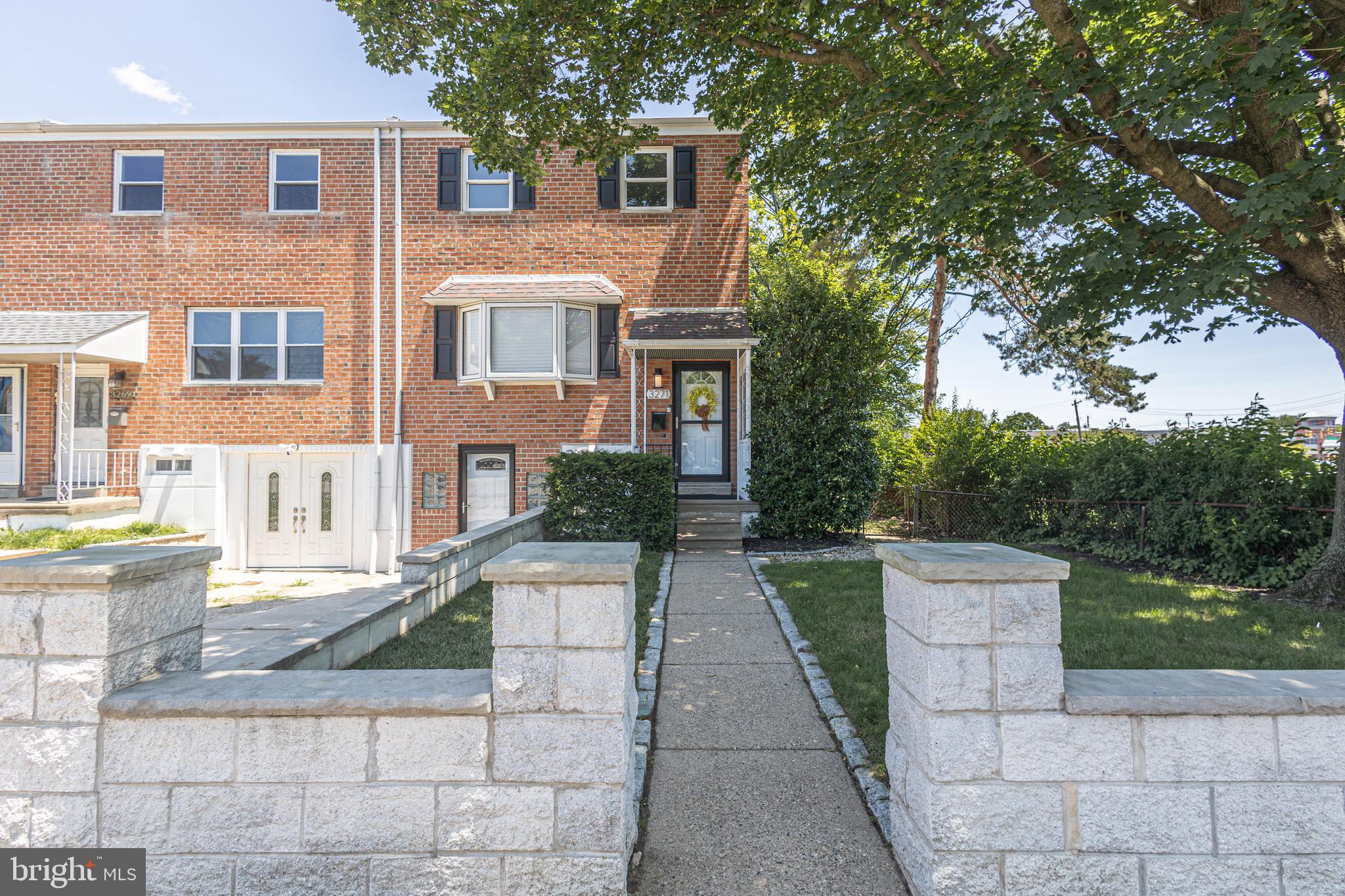 Immaculate 4 bedroom, 1.5 bath end-unit townhome is nestled in desirable Parkwood and feels like a spacious single, with the large side yard! Beautiful curb appeal with custom stone columns that create a grand walk-way leading to the covered front porch . Step into the tiled foyer and to the expansive living room, complete with gleaming hardwood floors, bay windows, recessed lighting, and modern ceiling fan. The sundrenched kitchen boasts plenty of sleek white cabinets, new dishwasher, recessed lighting, gas stove, and leads to the elegant dining room! The finished, walk-out basement has LVP flooring, laundry room with washer & dryer, and bright sliders to the covered brick patio. Enjoy the lush fenced-in yard and storage shed! Perfect backyard oasis! There is a guest bedroom on lower level with separate front entrance that can be used as a study or in-law suite with powder room. The additional 3 bedrooms upstairs have plush carpeting, fresh paint, modern ceiling fans, and large closets. Don't forget the attic with pull downstairs - great for storage! Easy access to Roosevelt Blvd, Academy Rd, Knights Rd, 63, 132, & NE Philadelphia Airport. Cameras/video recording at property.