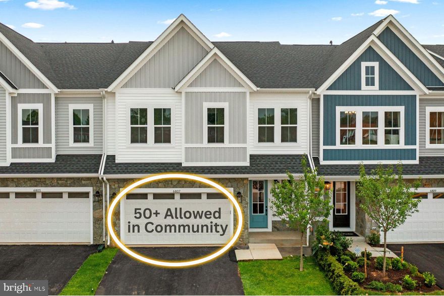 MOTIVATED SELLER. $25K price reduction! •• Robinson Manor is a 50+ Villa-style community w/ a low HOA of $208 per month & low utility bills  ---> You can live here as long as one adult is 50+. ••  Fully loaded home built in 2023  has 2 levels, 3 bedrooms, 2.5 baths,  2270 total SF and a 2 car garage. •• 10 foot ceilings, 8 foot doors. •• Main level common areas & Loft w/ beautiful Luxury Vinyl Plank & oak risers stained to match •• PRIMARY SUITE on the MAIN LEVEL w/ custom 2" blinds, a luxurious en-suite bathroom w/ double vanities, quartz counters, upgraded rimless shower door, linen closet, plus a walk-in closet and plenty of natural light.  Room for a king bed plus other furniture! •• KITCHEN/DINING w/a spacious island that seats 4, quartz counters, designer hardware, built-in microwave, gas range/stove with 2 ovens, refrigerator, disposal, backsplash, light dimmers, pantry &  a coffee nook for your morning java. There is plenty of room for a kitchen table.  •• GREAT ROOM w/ a gas fireplace & mantle, and sliding doors to the backyard. •• The upstairs LOFT w/ Luxury Vinyl Plank can be whatever you want it to be - a second family room, exercise room, whatever you desire. The loft also has a large linen closet, full bath & mechanical room •• Spacious 2ND BEDROOM w/ large walk-in closet and custom 2" blinds. •• 3RD BEDROOM w/ closet and custom 2" blinds. •• Carpets have upgraded comfort gel pads •• RECESSED LIGHTING is in every room •• DUAL ZONE HVAC. •• Family room, loft and all bedrooms are wired for ceiling fans/lighting  ——>>> Built in 2023, the owners have taken great care of their home and have made the following improvements:---->> GARAGE (2024) -  the unfinished garage was taped, sanded, primed & painted, walls & ceiling.  Polyaspartic coated flooring installed (more durable than epoxy) & 2 shelves attached.  •• Beautiful paver PATIO & FENCE (both 2024) plus all new rocks in rear • 2 inch custom blinds (2024) •• HVAC  UV Lamp (2024) to combat bacteria and Aprilaire filter installed. •• LG Washer/Dryer (2024) front loading on pedestals  on main level. •• Interior paint (2024)  Over $25K spent! •••••• The HOA will come inside your fence and mow the grass /mulch the tree if you unlock the gate on landscaping day.  They will also take care of the front. •••• Robinson Manor is conveniently located near shopping, dining, entertainment, Virginia Wine Country & breweries. ••  One block to Main Street in the quaint Town of Haymarket ---> Enjoy a farmers market, cute shops, cafes and The Farm Brewery at Broad Run. •• Walk to Trouvaille Brewing Co,  Zandra's Taqueria & an ice cream shop •• Short drive to favorites Lark Brewery & 2 Silos Brewing Company ••  2 miles to Virginia Gateway with shopping/dining including Target, Home Goods, Best Buy, Wegmans, restaurants and so much more! ••  45 minutes to Shenandoah National Park ••  MULTIPLE GOLF COURSES within  3-5 miles. ••••Enjoy pickleball/pool/walking paths/fire pit/outdoor covered BBQ grill in RM, plus a cute barn w/ kitchen/bathroom/TV/dining table. ••  COMMUTING - Easy access to 66/15/29/15 and the Heathcote/Haymarket Commuter Lot is 1.5 miles away. •• Dulles Airport 30 minutes