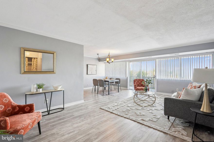 Top-floor corner unit with incredible sunset views in the sought-after Seasons Condominium community! This spacious 2-bedroom, 1,110 sq. ft. home is move-in ready with stylish upgrades throughout, including a newly renovated kitchen and bathroom, brand-new flooring, and fresh designer paint.

The open-concept living and dining area is filled with natural light from oversized windows and sliding glass doors that lead to a large private balcony—perfect for relaxing or entertaining. The primary bedroom features a walk-in closet, and there’s generous storage throughout. Pets allowed (with size restrictions).

The Seasons is a garden-style condo community with elevators, a swimming pool, and beautifully maintained grounds. Located just off I-395, it’s a commuter’s dream—only 9 miles to D.C., walking distance to Metrobus, and close to both Reagan and Dulles airports.

Enjoy nearby shopping and dining at Landmark Mall, plus parks like Holmes Run and Brookvalley. Explore historic sites including Fort Ward, Mount Vernon, and The Lyceum—all minutes away.

The monthly condo fee includes all utilities (electric, gas, water, sewer), as well as exterior maintenance, management, pool, snow removal, trash, and more. FHA-approved and ready for its next owner—schedule your showing today!